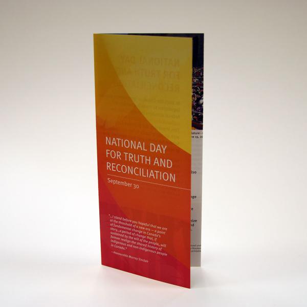 An orange brochure for the National Day of Truth and Reconciliation.