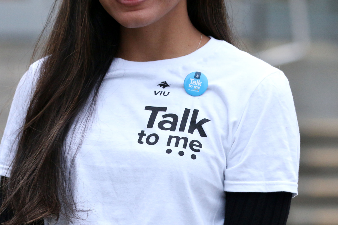 wearing a talk to me button