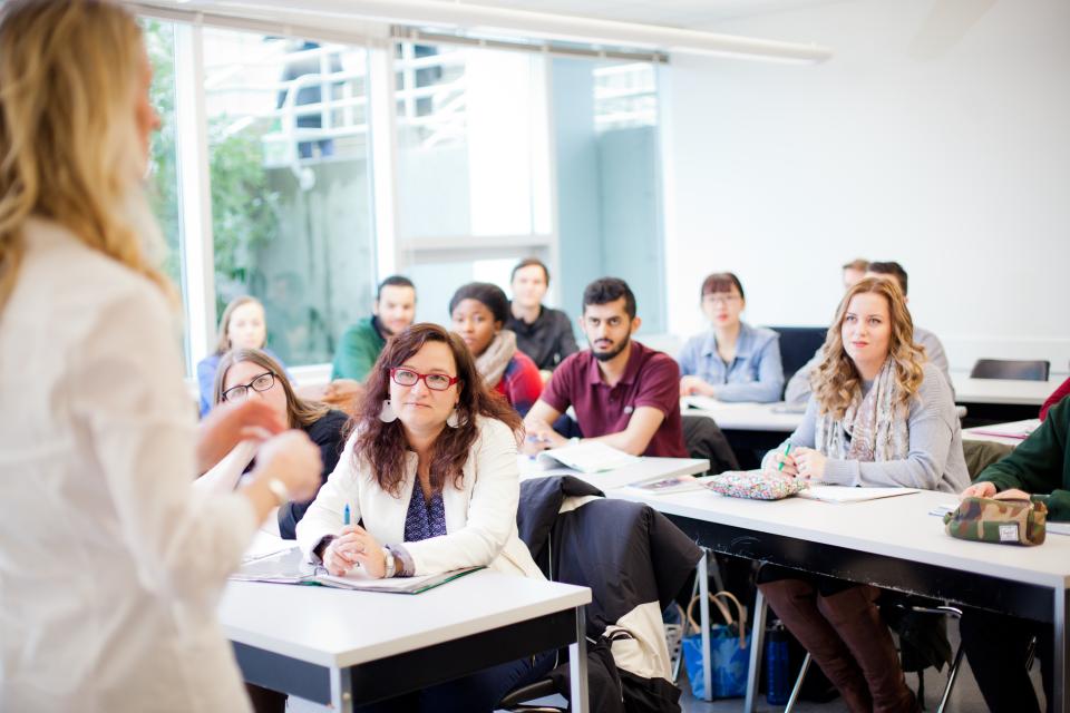 A group of business students sitting in a classroom