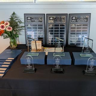 WIL awards 2025 plaque and trophy table