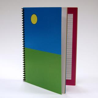 A spiral bound notebook.