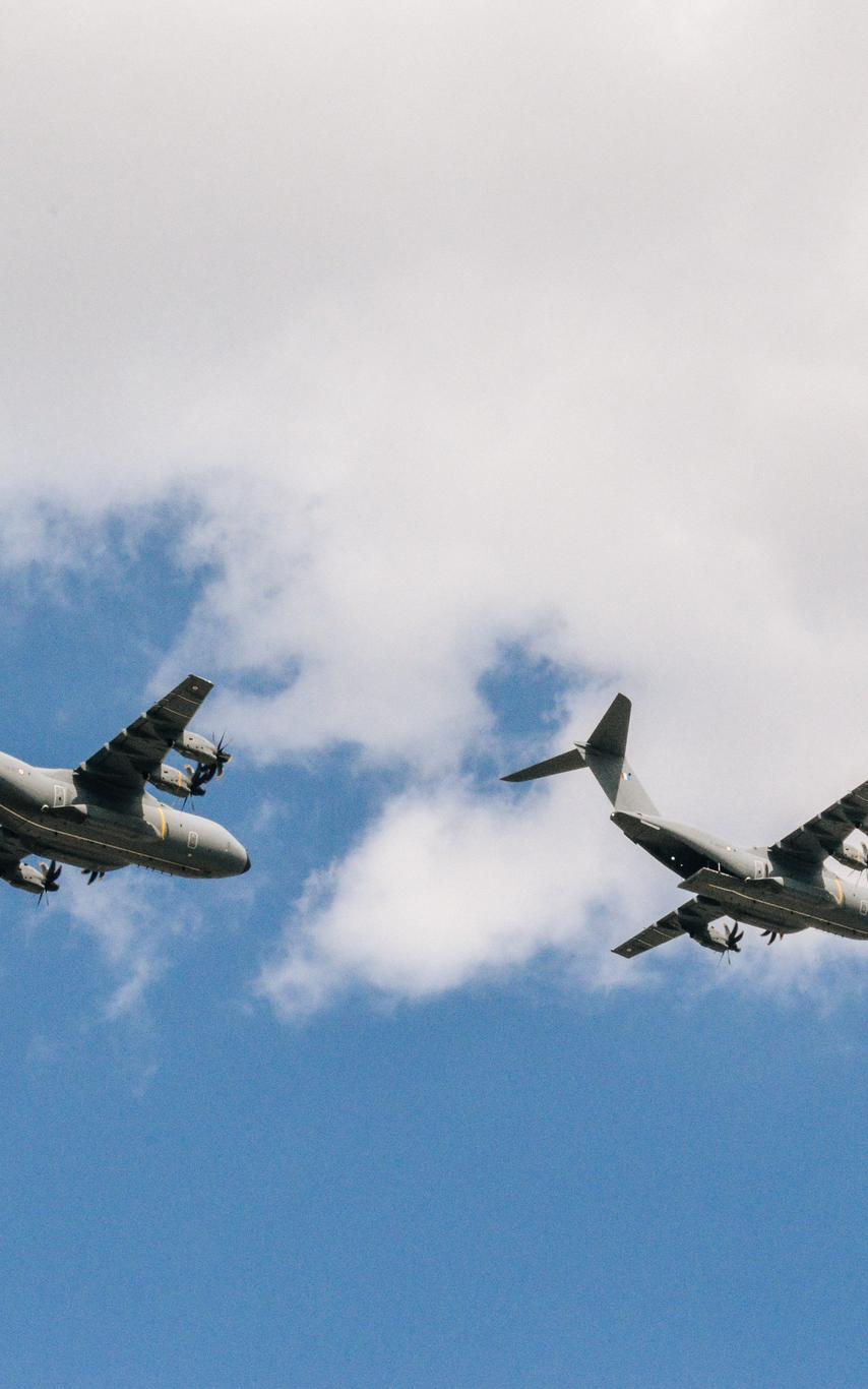 Two planes flying in the sky