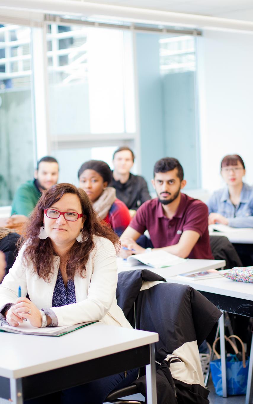 A group of business students sitting in a classroom