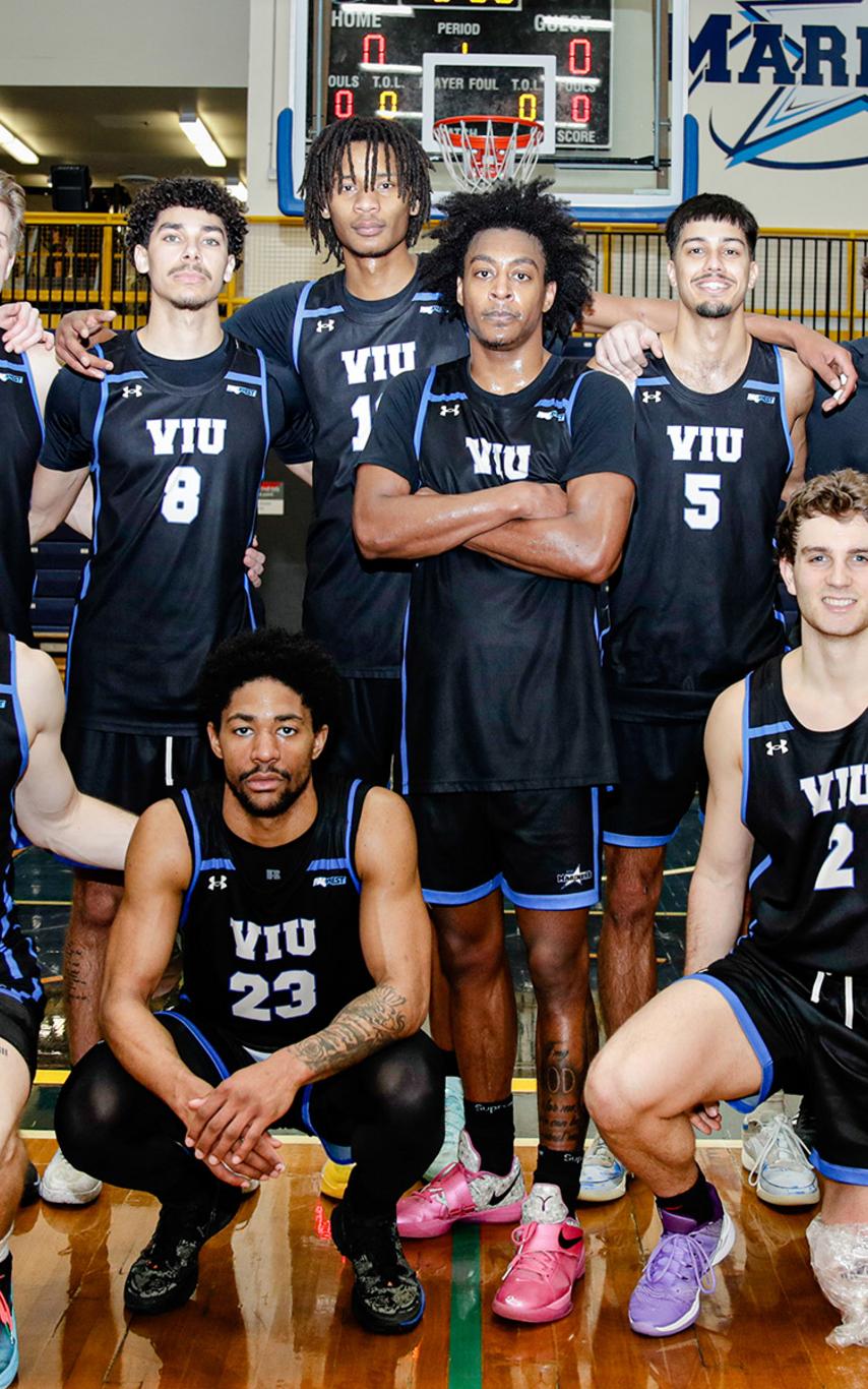 Basketball players in blue uniforms