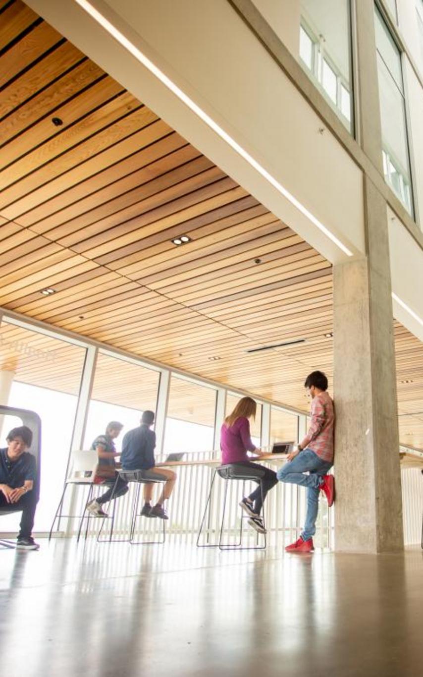 Inside building 110 with people sitting